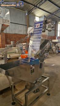 Alimentador posicionador abastecedor vibrat�rio em a�o inox de tampas Norma
